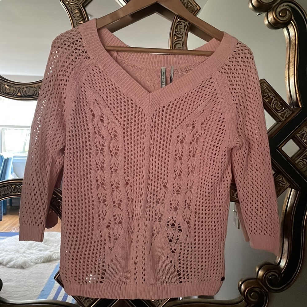 Guess top with cute cut on the back